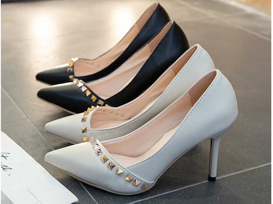 Women's rivet on vamp slip on high heel dress shoes