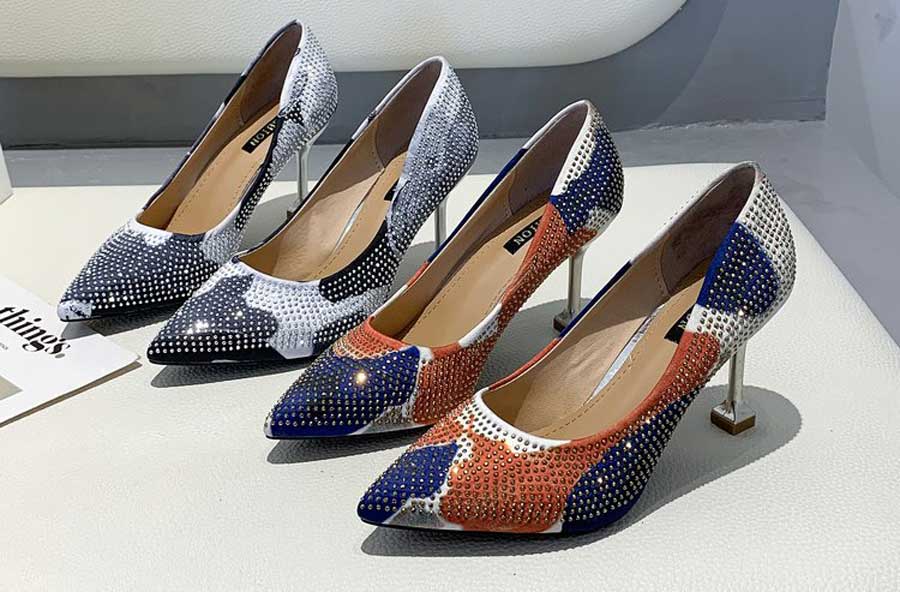 Women's mixed pattern rivet slip on heel dress shoes