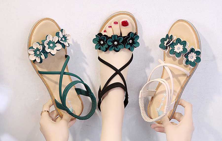 Women's flower ornament criss cross slip on shoe sandals